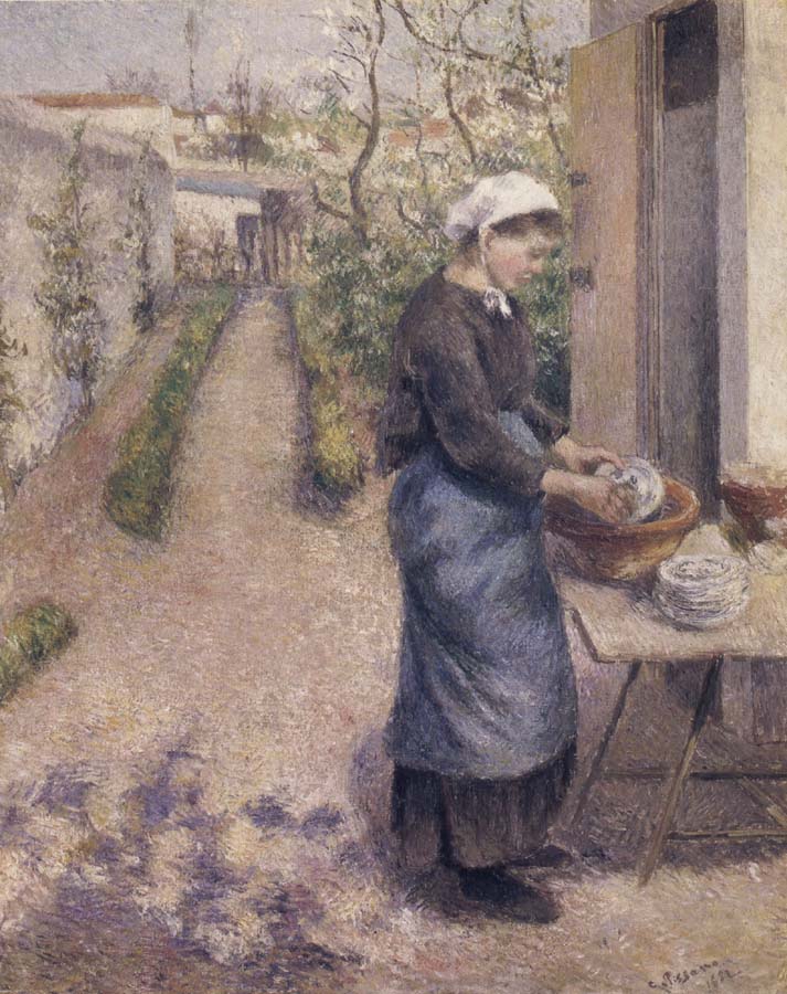 Woman washing dishes